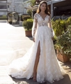 Detail of elegant white lace floral embroidery on the long sleeves and deep V-neckline - US 2 / White