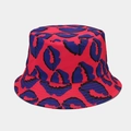 Close-up of red and blue lip pattern on reversible double-sided graffiti bucket hat - M (56-58cm) / Red Lip Print