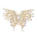 Golden butterfly brooch with sparkling white crystals and iridescent AB rhinestones - White