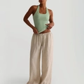 Y2K green halter neck camisole top paired with beige wide-leg linen pants for summer - S / Bean Green