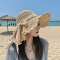 Beige wide brim straw sun hat with wavy edges and decorative lace ribbon detail - One Size / Striped Lace Ribbon - Beige