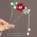 U-shaped hair pin with red velvet flower, green leaves, and elegant pearl tassels - Red Flocked Crystal Flower U-shaped Double Prong