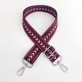 Macro detail of wine red nylon strap with arrow pattern and silver metal hardware - Purple Silver Thread + Silver Buckle