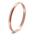 Polished rose gold titanium steel bracelet with faceted geometric hammered surface and clasp - Rose Gold