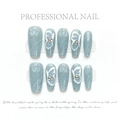 Detailed view of handmade press-on nails with blue glitter and 3D butterfly charms - Hand-painted Butterfly (185)
