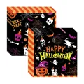 Detail showing Halloween themed paper napkins with pumpkin and witch patterns on black background - Halloween Napkins (24 Sheets)