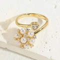 Gold open ring featuring a pearl flower cluster and a heart-shaped zircon gemstone - Heart Style