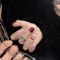 Christmas press-on nails featuring Santa, snowman, and plaid patterns on black fuzzy fabric - Extra Small (XS) / Christmas Reindeer
