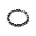 Macro detail of dark grey hematite beads showing smooth metallic luster on the bracelet - Round Beads