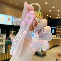 Rosa Einhorn Flüssig-Schlüsselanhänger mit Glitzersternen und Blumenarmband - Sakura Einhorn-Rosa