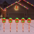 Solar powered Christmas garden lights with red and green gift box toppers and candy cane poles - Style 5