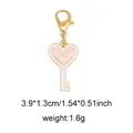 Pink heart key charm with gold lobster clasp and white trim, size 3.9x1.3cm - Style 39 Heart Key Enamel