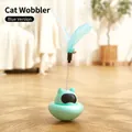 Blue cat tumbler toy with suction base featuring a spring feather and a bell - Tumbler Toy / Blue