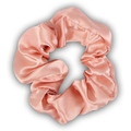 Pink satin fabric scrunchie with silky pleated texture and elegant glossy finish - Pink