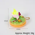 Green doughnut keychain with cream and star decoration, dimensions 4.5cm by 4.5cm - Candy Donut Decoration (With Gold Bead Chain) / 4.50cm / Verdant