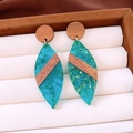 Detail of teal resin earrings with gold leaf flakes and wooden circular stud accents - Patchwork Leaf Style / Blue