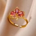 Adjustable gold ring featuring a red zircon maple leaf on elegant beige silk fabric - Gold Red Maple Leaf (G1134424)