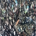 Dettaglio della tenda a frange nera olografica con stelle e riflessi arcobaleno - Forma a S Effetto Ceramica (Decorazione in PVC) / Nero