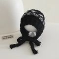 Detailed knit texture and woven patterns on black plush balaclava with tie-up straps - 2-8 Years / Black