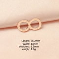 Colgante símbolo infinito oro rosa sobre seda rosa con detalle 25,2x13mm - Oro rosa