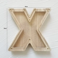 Letter X shaped wooden piggy bank with transparent acrylic panel and size measurements - Letter X