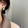 French retro style green C-shaped stud earring with gold metal band on female model - Ear Clip (Non-Pierced) / Bean Green