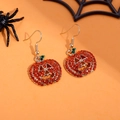Halloween pumpkin drop earrings with orange rhinestones and gold hooks on festive background - FX259 (Gold Rhinestone Pumpkin)