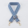 Detail of blue and white striped herringbone bag strap with gold metal hooks and buckle - Light Gold Buckle / Blue/White Stripes