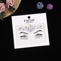 Macro detail of iridescent purple face gems and crystal stickers for festival makeup - Purple Series