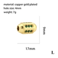 Vue macro d'une perle œil cœur plaquée or 18K avec zircon vert et trou de 4mm - Perle Cylindrique Zircone Verte(P03696)