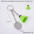 Miniatuur badminton sleutelhanger met groene shuttle en zilveren racket - Grasgroene Shuttle + Racket