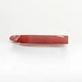 Detailed view of large red jelly banana hair clip with glossy finish and minimalist design - Pink