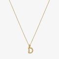 Macro shot of gold D-letter pendant with lava texture and pavé zircon settings - 925 Silver / Gold - Letter D