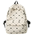 Cream corduroy backpack with black bow prints and side ribbon details for students - One Size / White