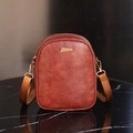 Retro brown oil wax leather crossbody mobile phone bag with golden metal buckle and wide strap - Tan