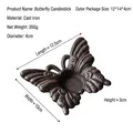 Bougeoir papillon vintage en fonte avec une finition marron rustique et texture embossée - Bougeoir Papillon en Fonte (8811)