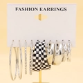 Detail view of 5-piece silver earrings set with various hoop styles and checkered designs - Checkerboard Silver Twisted Rope (04)
