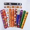 Variety of colorful Halloween themed slap bracelets with festive pumpkin and bat designs - 12 Designs Halloween Pack