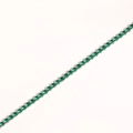 Macro view of silver tennis bracelet with single row of round emerald green zircons - Platinum Plated - Green Zirconia