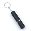 Close-up of a portable black travel perfume atomizer spray bottle with a metal keychain - Black