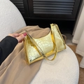 Chic gold metallic baguette bag with crocodile pattern and a minimalist shoulder strap - Gold