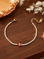 Detail of gold flower tennis bracelet featuring red zircon petals and cubic zirconia stones - Red Flower Style (ZHB320-Red)