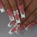 Pink French bow and pearl press-on nails in long coffin shape on hand model - K008【24pcs】 / Boxed (jelly Gel + Granules)