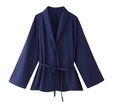 Detailed view of deep blue jacquard kimono top with matching waist tie on white background - Blue Top