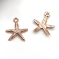 Ciondoli a stella marina in metallo oro rosa per gioielli fai da te su sfondo bianco - Stella Marina Pentagramma / 17x19mm / Oro rosa