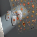 Pegatinas doradas para uñas con sol y estrellas y diseño de relieve de gema Co-427 - Estilo Estrella de Sol Gema Roja Palacio (CO-427)
