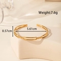 Adjustable open cuff bracelet in gold finish with hollow ginkgo leaf design - Geometric Hollow Thin Style (YB-203)