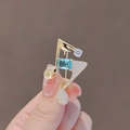 Elegant gold musical note brooch with blue gemstone and sparkling crystal accents - 448# Musical Note