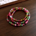 Bracelet en perles de tourmaline multicolores avec papillon en zircon sur bois - Perles Style Tourmaline Multicolore Violettes