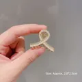 Kleine goldene Perlen-Haarklammer mit Unendlichkeitssymbol für Haarstyling - M1-018 Bandperle